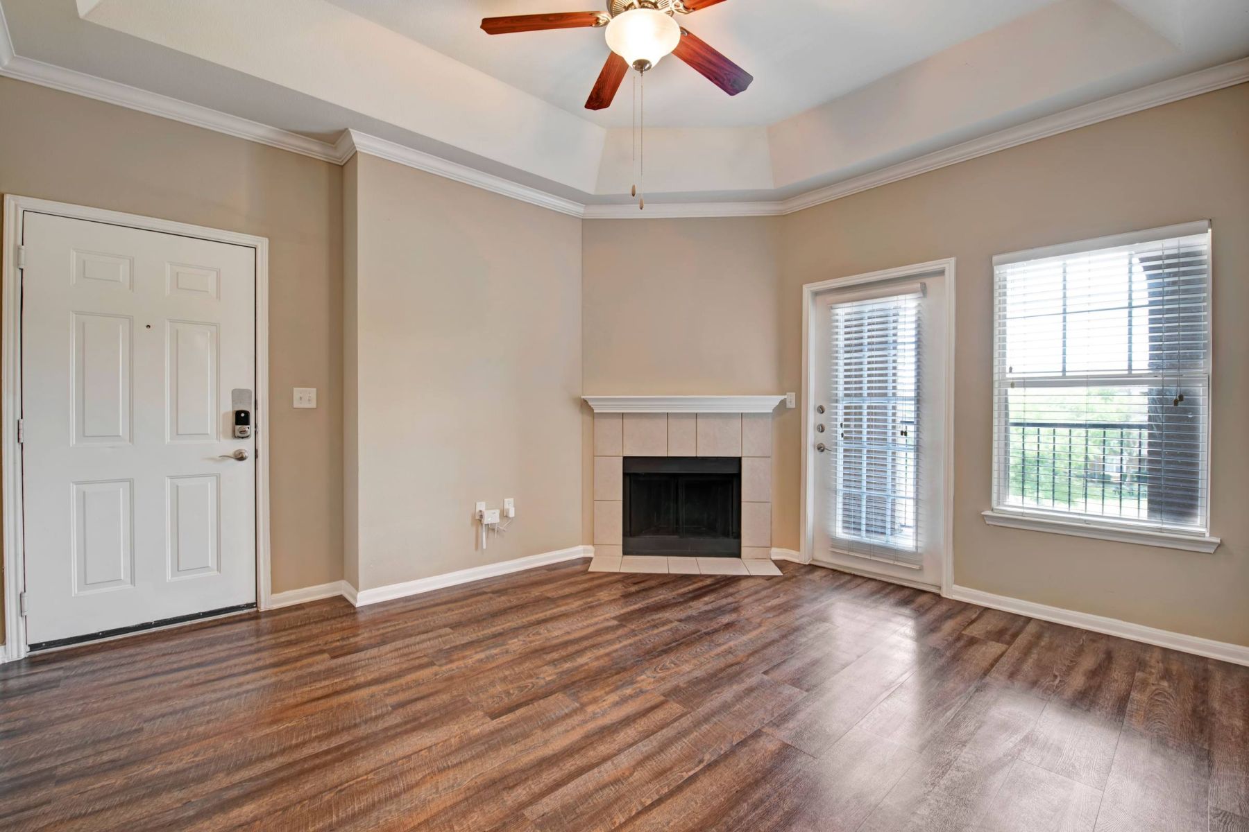 Luxury apartment kitchen with stainless steel appliances, granite countertops, and lots of storage space